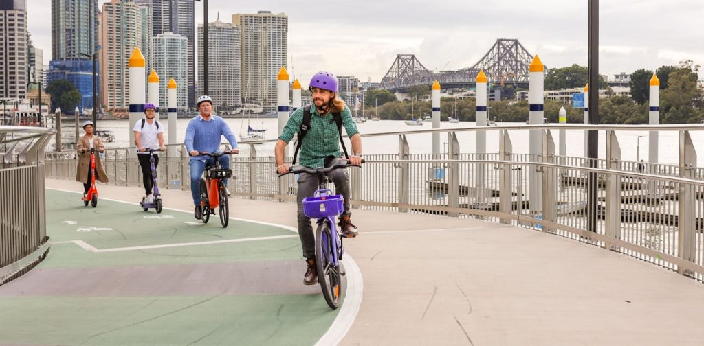 Cinco años después, los scooters y las bicicletas eléctricas de Brisbane se están conquistando a turistas y residentes a medida que desbloquean la ciudad.