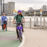 Cinco años después, los scooters y las bicicletas eléctricas de Brisbane se están conquistando a turistas y residentes a medida que desbloquean la ciudad.