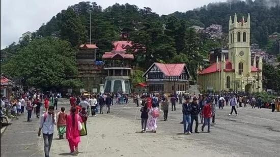 People strolling at the Ridge in the heart of Shimla. Hotels and travel agents are offering discounts aimed at reviving the <span class=