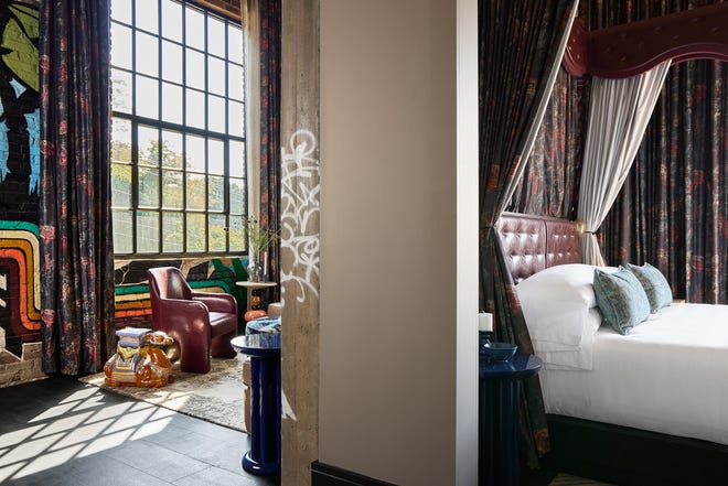 Una representación artística de una habitación de huéspedes en The Radical, un hotel boutique que se inaugura en el River Arts District de Asheville.