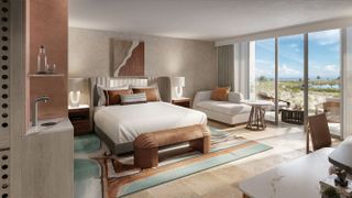 El Hotel Salterra en Islas Turcas y Caicos ofrece una amplia habitación con lavabo y cama king-size y vistas a la playa exterior.