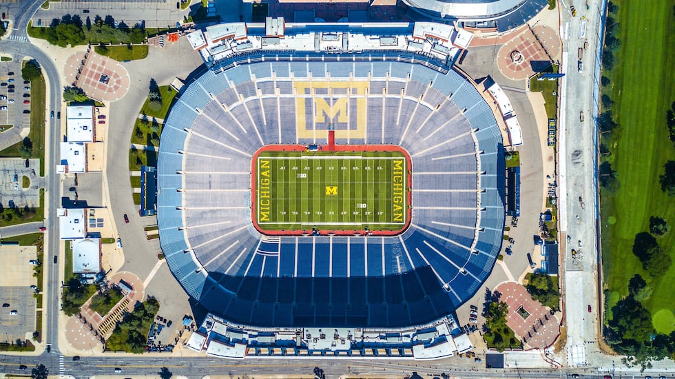 Anuncio para el programa de fútbol de Michigan para el escándalo robado