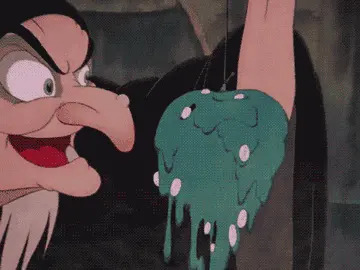 Desde la escena del clásico cuento de hadas, el verde en un cable, bruja dinámica en las burbujas manzana