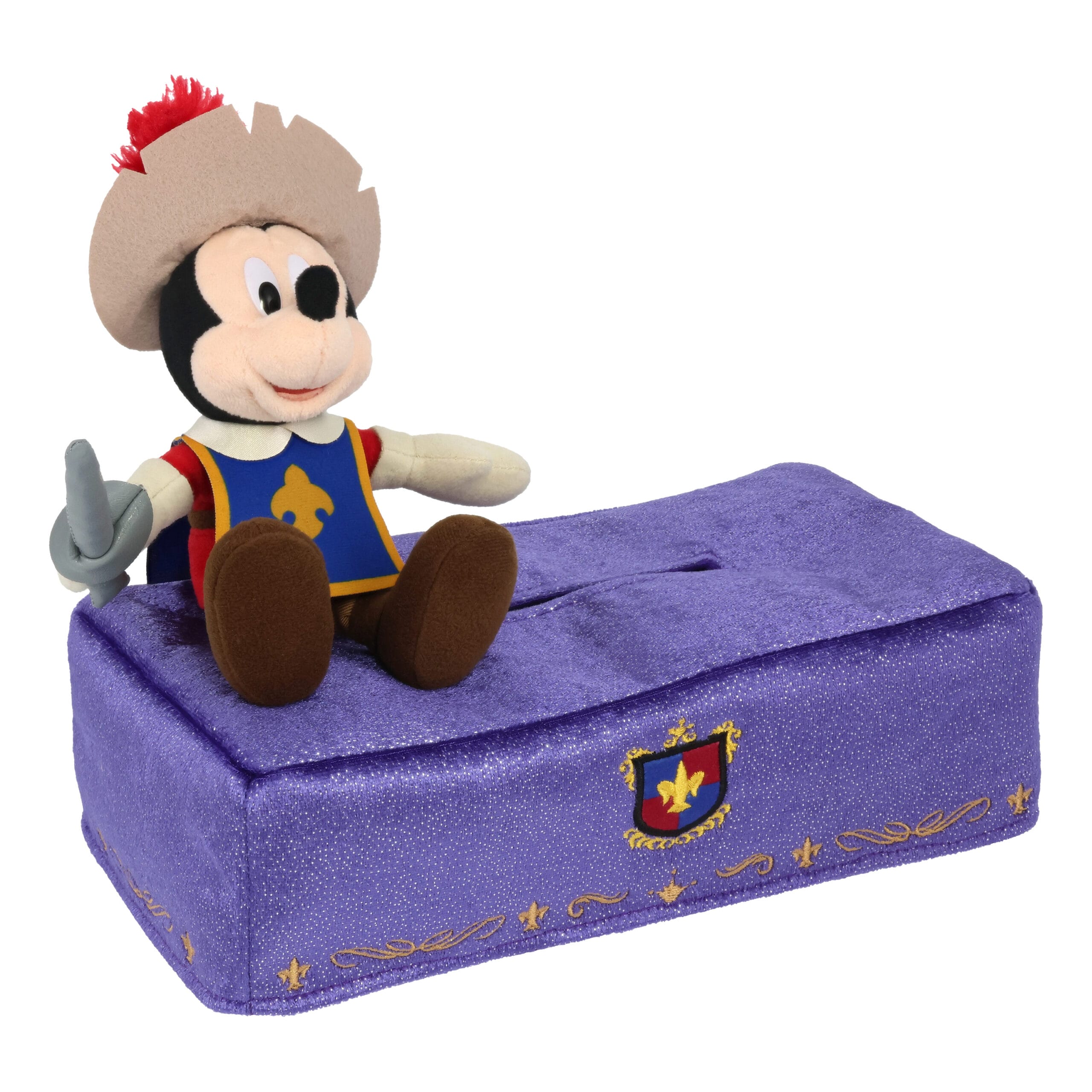 El peluche de Mickey Mouse estaba sentado en una caja rectangular púrpura con un diseño de corteza como un músculo.